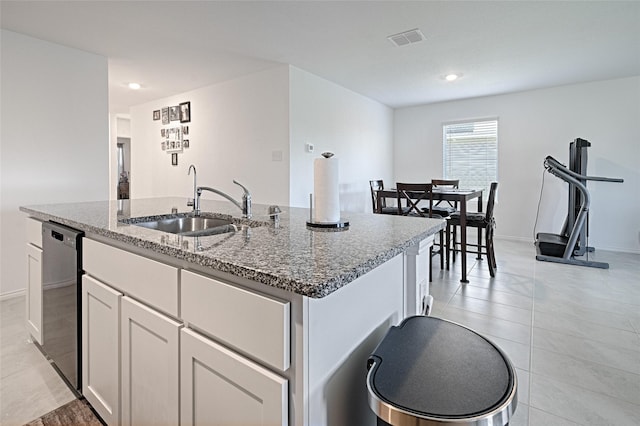 1773 Courage Crk, Crandall, TX 75114 - kitchen featuring dishwasher, light stone counters, an island with sink, white cabinets, and recessed lighting