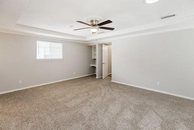 3101 Bonniebrook Dr, Plano, TX 75075 - carpeted empty room with a tray ceiling and ceiling fan