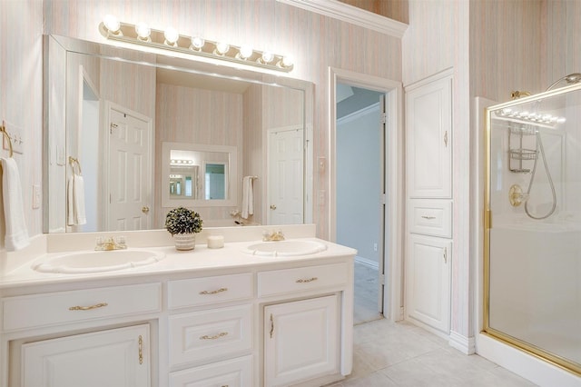 133 Sunny Meadows Dr, Burleson, TX 76028 - bathroom with wallpapered walls, double vanity, a shower stall, and tile patterned floors