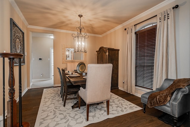 637 Grisham, Fate, TX 75087 - dining area with dark wood finished floors, ornamental molding, and a chandelier