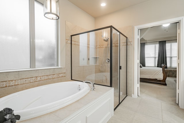 637 Grisham, Fate, TX 75087 - bathroom with a bath, a stall shower, connected bathroom, tile patterned flooring, and recessed lighting