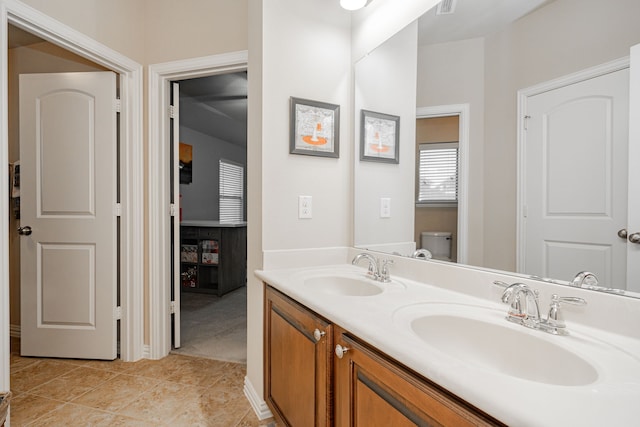 637 Grisham, Fate, TX 75087 - bathroom featuring double vanity and tile patterned floors