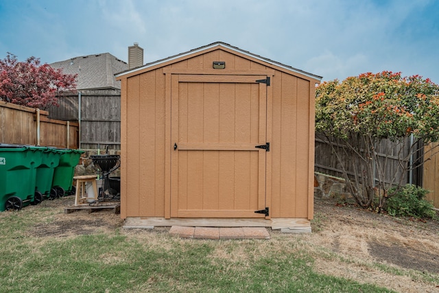 637 Grisham, Fate, TX 75087 - view of shed with a fenced backyard