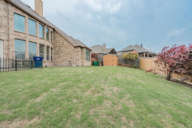 637 Grisham, Fate, TX 75087 - fenced backyard featuring a shed