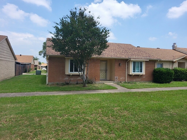 56 E Mountain Creek Dr Unit 22, Grand Prairie, TX 75052 - ranch-style home featuring brick siding, a front yard, and a shingled roof