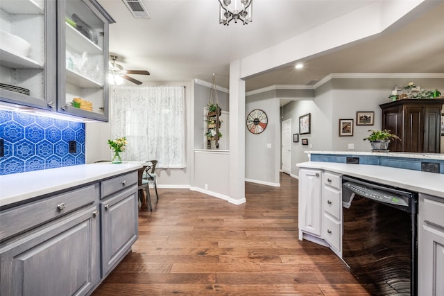 1506 Pine Hills Ln, Corinth, TX 76210 - kitchen with dishwasher, light countertops, ornamental molding, decorative backsplash, and dark wood-style floors