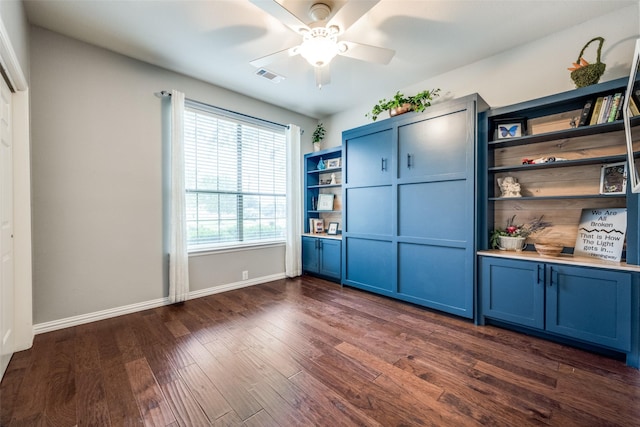 1506 Pine Hills Ln, Corinth, TX 76210 - unfurnished bedroom with dark wood-style flooring and ceiling fan