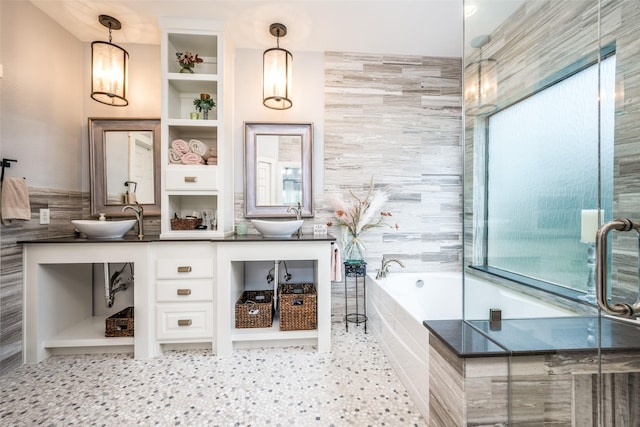 1506 Pine Hills Ln, Corinth, TX 76210 - bathroom with double vanity, a garden tub, and healthy amount of natural light