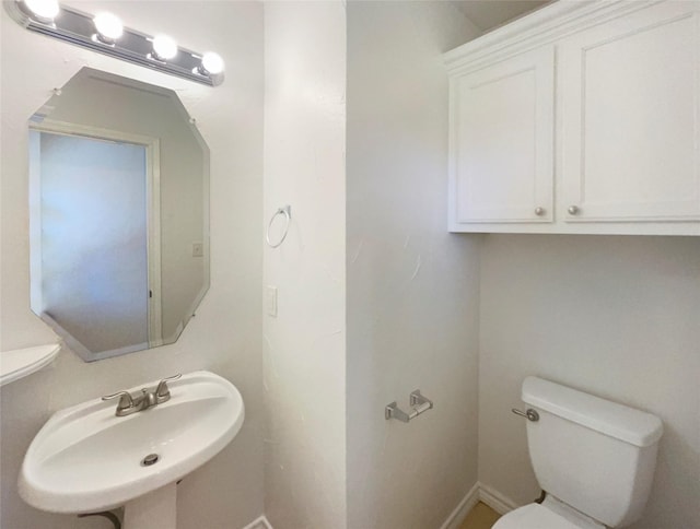 6231 Bridle Trl, Caddo Mills, TX 75135 - bathroom with toilet and a sink