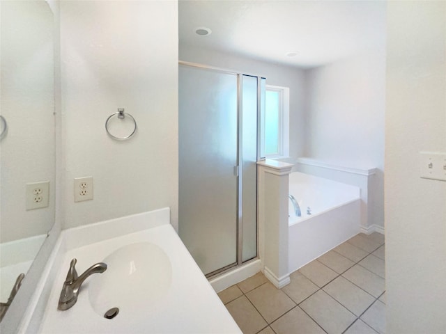 6231 Bridle Trl, Caddo Mills, TX 75135 - bathroom with a stall shower, tile patterned flooring, a garden tub, and vanity