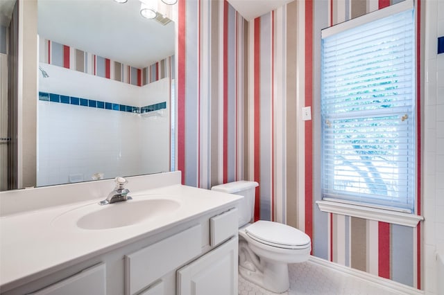 6001 Autumn Way, Mckinney, TX 75072 - bathroom featuring wallpapered walls and vanity