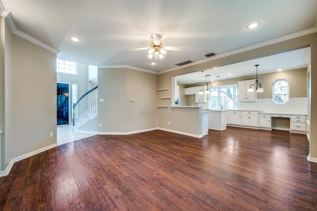 6001 Autumn Way, Mckinney, TX 75072 - unfurnished living room featuring a ceiling fan, dark wood finished floors, stairs, recessed lighting, and ornamental molding