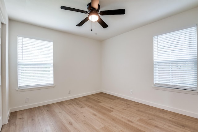 826 Nash St, Rockwall, TX 75087 - spare room with light wood-style flooring, plenty of natural light, and ceiling fan