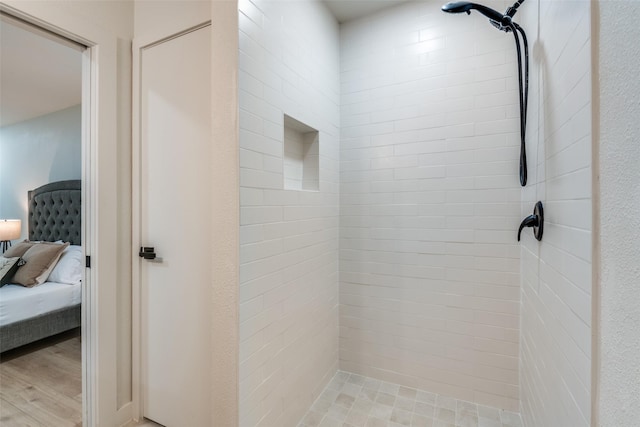 826 Nash St, Rockwall, TX 75087 - ensuite bathroom featuring tiled shower and wood finished floors