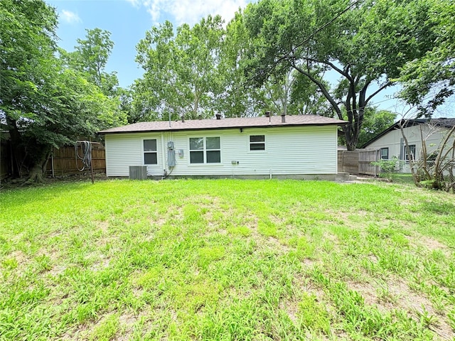 826 Nash St, Rockwall, TX 75087 - back of house with a fenced backyard