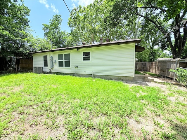826 Nash St, Rockwall, TX 75087 - rear view of property with a fenced backyard