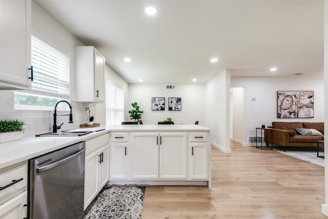 826 Nash St, Rockwall, TX 75087 - kitchen featuring dishwasher, a peninsula, white cabinets, light wood-style flooring, and light countertops