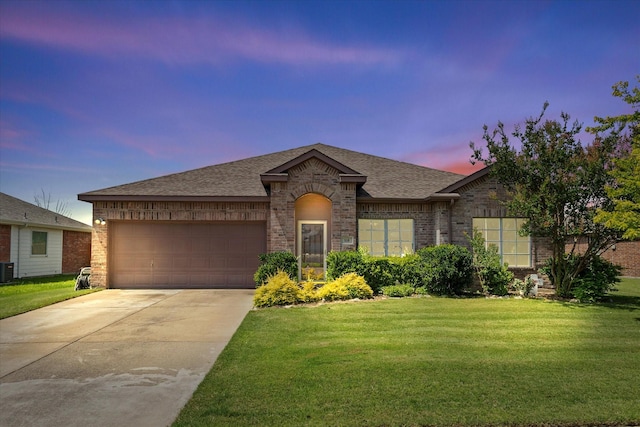 118 Independence Trl, Forney, TX 75126 - view of front facade with brick siding, a shingled roof, a front yard, a garage, and concrete driveway