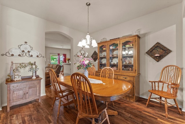118 Independence Trl, Forney, TX 75126 - dining area with arched walkways, dark wood-style floors, and a chandelier