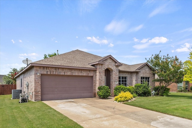 118 Independence Trl, Forney, TX 75126 - view of front of home with brick siding, an attached garage, roof with shingles, and driveway