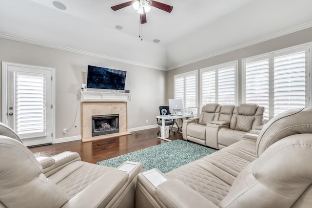 114 Stonecreek Dr, Irving, TX 75063 - living area with a ceiling fan, wood finished floors, a fireplace, ornamental molding, and vaulted ceiling