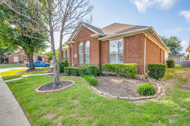 114 Stonecreek Dr, Irving, TX 75063 - view of side of property featuring brick siding, a lawn, and a shingled roof