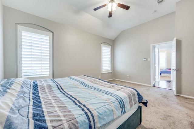 114 Stonecreek Dr, Irving, TX 75063 - carpeted bedroom featuring vaulted ceiling and ceiling fan