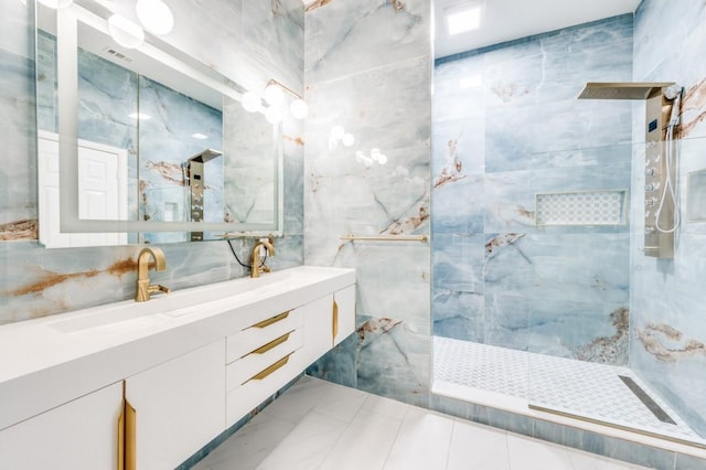 114 Stonecreek Dr, Irving, TX 75063 - full bathroom featuring tile walls, a marble finish shower, and vanity