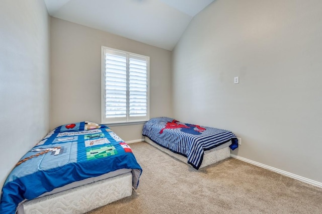 114 Stonecreek Dr, Irving, TX 75063 - bedroom featuring carpet floors and vaulted ceiling