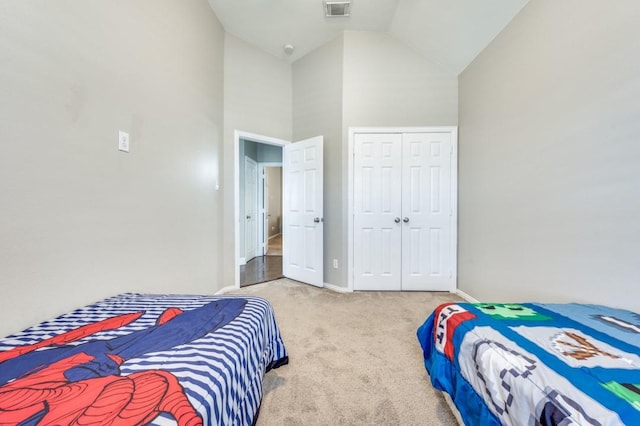114 Stonecreek Dr, Irving, TX 75063 - carpeted bedroom featuring high vaulted ceiling and a closet