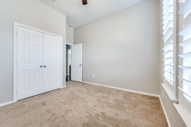 114 Stonecreek Dr, Irving, TX 75063 - unfurnished bedroom featuring carpet, a closet, and ceiling fan