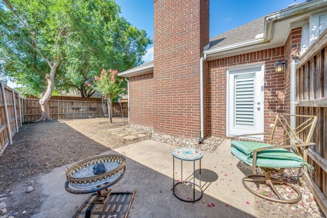 114 Stonecreek Dr, Irving, TX 75063 - fenced backyard with a patio area