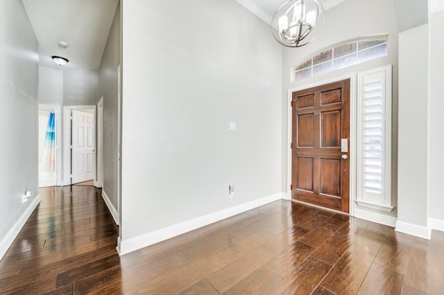 114 Stonecreek Dr, Irving, TX 75063 - entrance foyer with a chandelier, dark wood-style flooring, and a high ceiling