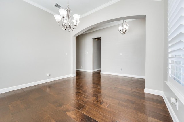 114 Stonecreek Dr, Irving, TX 75063 - spare room featuring a chandelier, arched walkways, ornamental molding, and wood finished floors