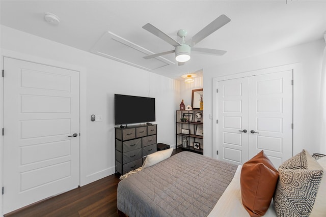 2340 Starks Ave, Dallas, TX 75215 - bedroom featuring dark wood-style floors, a closet, and a ceiling fan