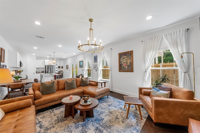 2340 Starks Ave, Dallas, TX 75215 - living area with a chandelier, dark wood-style floors, and recessed lighting