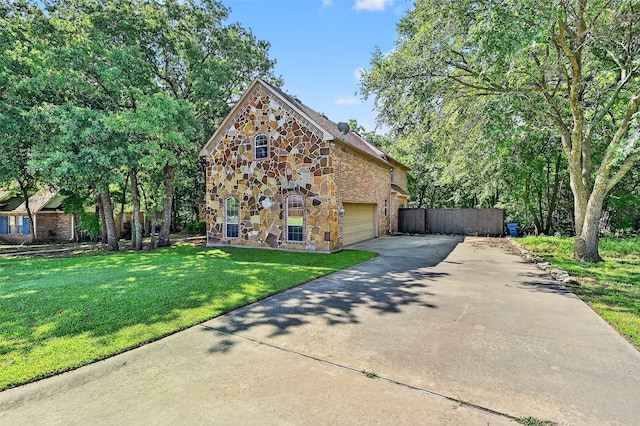 109 Lauren Ln, Pottsboro, TX 75076 - view of front of home featuring driveway and stone siding
