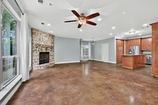 109 Lauren Ln, Pottsboro, TX 75076 - unfurnished living room featuring crown molding, concrete floors, ceiling fan, recessed lighting, and a fireplace
