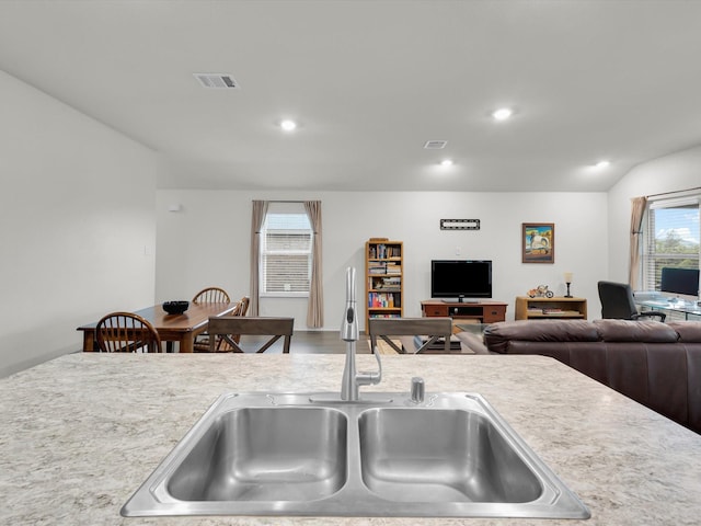 3100 Singleton Rd, Forney, TX 75126 - kitchen with open floor plan, light countertops, and recessed lighting