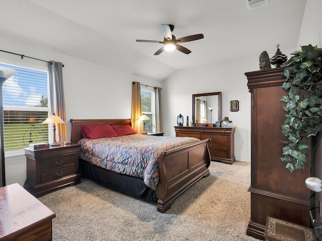3100 Singleton Rd, Forney, TX 75126 - bedroom with light carpet, multiple windows, a ceiling fan, and vaulted ceiling