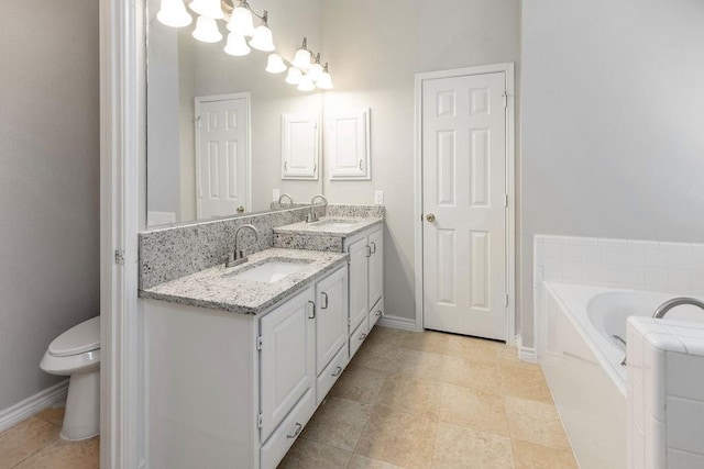 5006 Baton Rouge Blvd, Frisco, TX 75035 - full bathroom with double vanity, a garden tub, and a chandelier