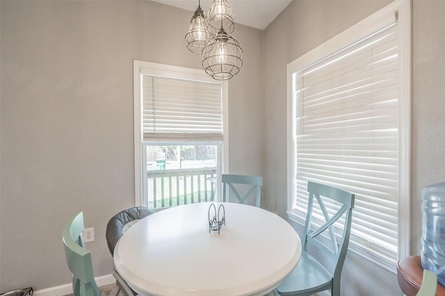 1020 Water St, Waxahachie, TX 75165 - dining space with a chandelier and baseboards