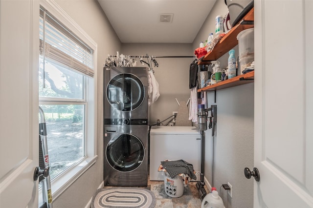 1020 Water St, Waxahachie, TX 75165 - washroom with stacked washing machine and dryer and healthy amount of natural light