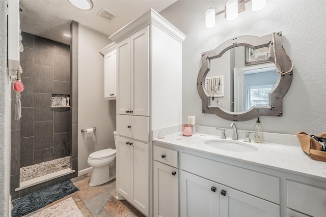 1020 Water St, Waxahachie, TX 75165 - bathroom with vanity and tiled shower