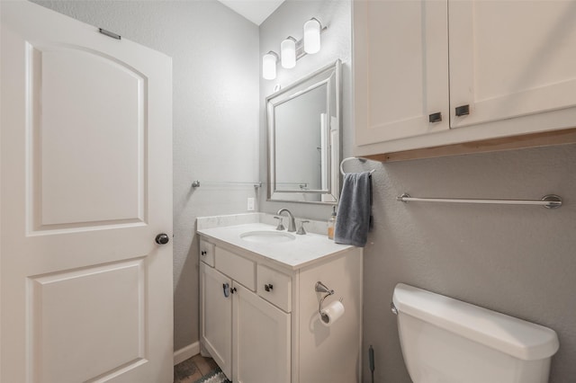 1020 Water St, Waxahachie, TX 75165 - bathroom featuring vanity and toilet