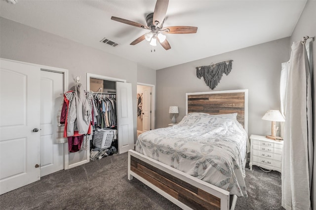 1020 Water St, Waxahachie, TX 75165 - bedroom featuring carpet flooring, two closets, and a ceiling fan