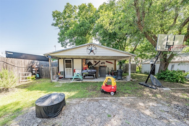 1020 Water St, Waxahachie, TX 75165 - view of front of house with a fenced backyard