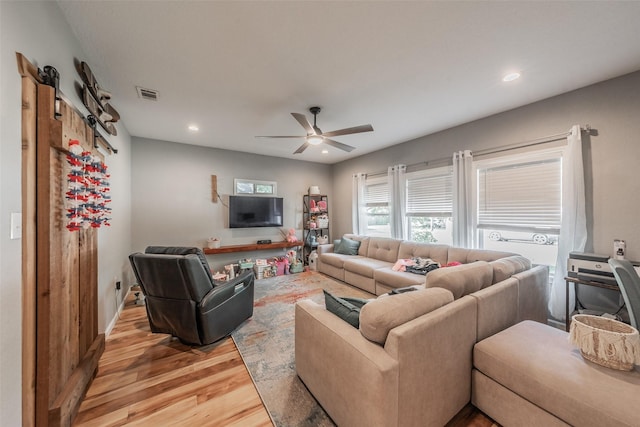 1020 Water St, Waxahachie, TX 75165 - living room with light wood-style floors, a ceiling fan, and recessed lighting