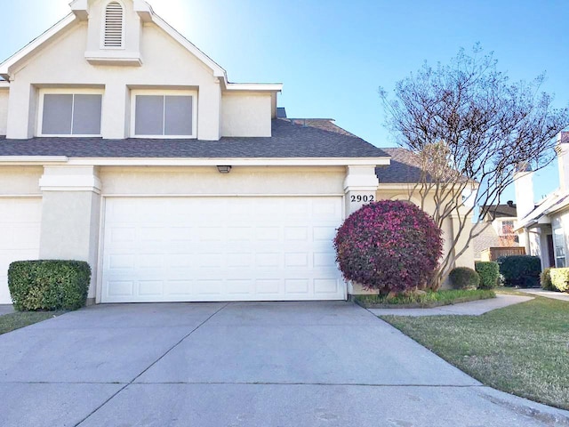 8400 Hickory St Unit 2902, Frisco, TX 75034 - view of front of house with stucco siding and concrete driveway