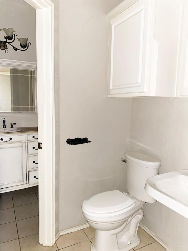 8400 Hickory St Unit 2902, Frisco, TX 75034 - bathroom featuring tile patterned flooring and toilet